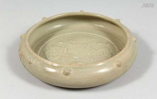 A CHINESE CELADON GLAZE CIRCULAR BRUSH WASHER, the interior ...