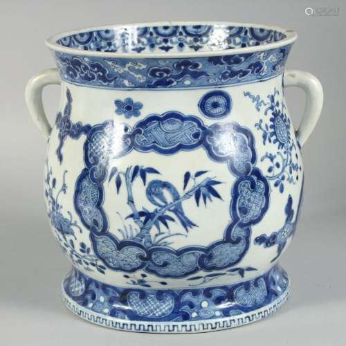A CHINESE BLUE AND WHITE PORCELAIN TWIN HANDLE JARDINIERE, t...