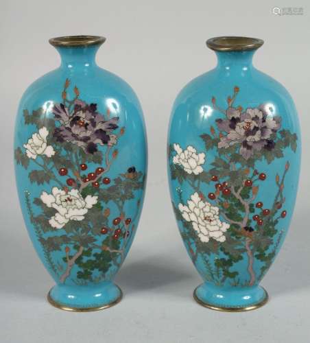A PAIR OF JAPANESE BLUE GROUND CLOISONNE VASES, finely decor...