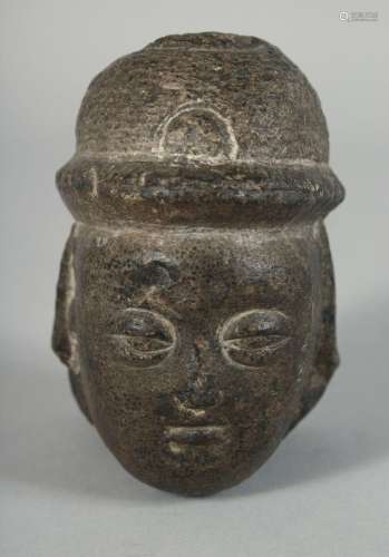 A CHINESE CARVED STONE HEAD, 9.5cm at widest point.