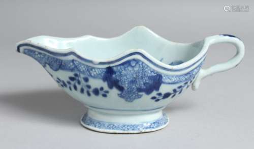 A CHINESE BLUE AND WHITE PORCELAIN SAUCE BOAT, the interior ...