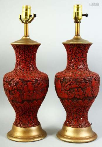 A PAIR OF CHINESE CINNABAR LACQUER LAMPS, the body of each w...