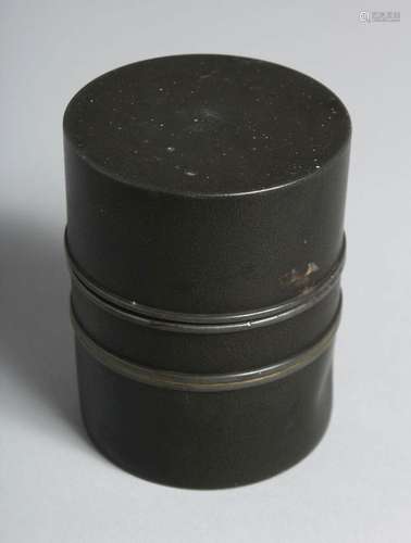 A CHINESE CYLINDRICAL METAL TEA CADDY, the base with impress...