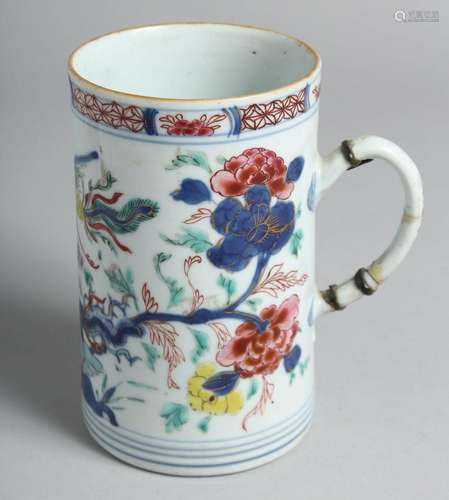 A CHINESE FAMILLE ROSE PORCELAIN TANKARD painted with floral...