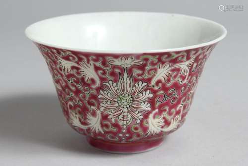 A CHINESE PINK GROUND PORCELAIN ENAMELLED BOWL with stylised...