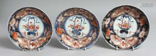 THREE JAPANESE IMARI PORCELAIN DISHES, each decorated with p...