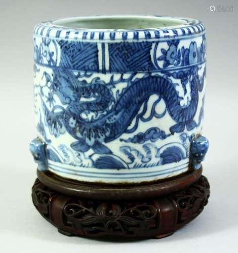 A CHINESE BLUE AND WHITE PORCELAIN CENSER and hardwood stand...