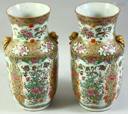 A PAIR OF CHINESE CANTON TWIN HANDLE PORCELAIN VASES, painte...