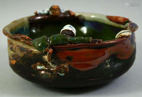 A JAPANESE SUMIDA POTTERY BOWL, with two partly glazed figur...