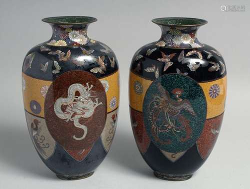 A PAIR OF JAPANESE CLOISONNE VASES, decorated with a central...