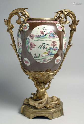 A LARGE CHINESE FAMILLE ROSE PORCELAIN URN WITH ORMOLU MOUNT...