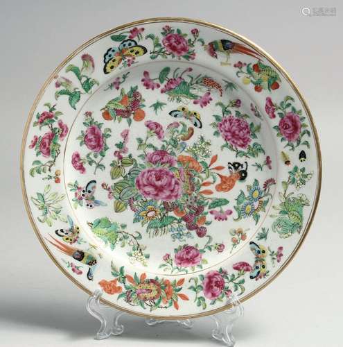 A CHINESE CANTON FAMILLE ROSE PORCELAIN PLATE, painted with ...