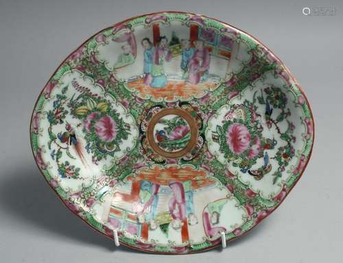 A CHINESE CANTON FAMILLE ROSE PORCELAIN DISH, painted with p...