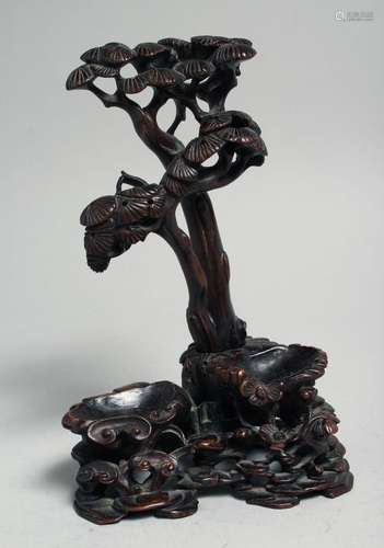 A CHINESE CARVED AND PIERCED HARDWOOD TREE FORM STAND, 17cm ...