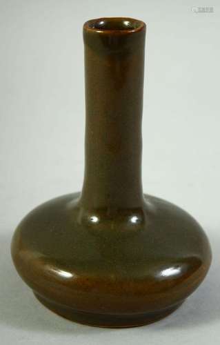 A CHINESE OLIVE GREEN GLAZE VASE, with impressed mark to bas...