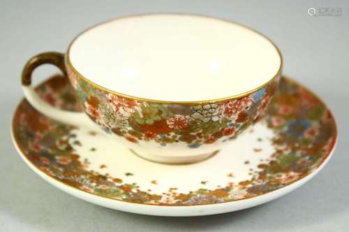 A SMALL JAPANESE SATSUMA CUP AND SAUCER, finely decorated wi...