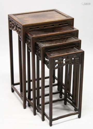 A GOOD NEST OF FOUR CHINESE ROSEWOOD RECTANGULAR TABLES, eac...