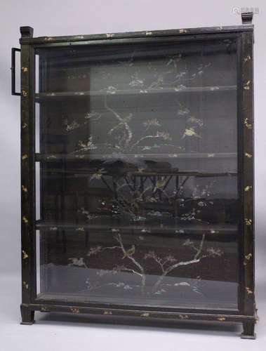 A JAPANESE BLACK LACQUERED HARDWOOD STANDING CABINET, glazed...