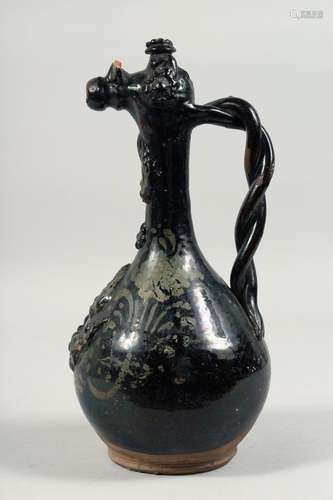 A 19TH CENTURY OTTOMAN CANAKKALE GLAZED POTTERY EWER, with t...