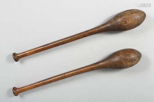 A PAIR OF 19TH CENTURY INDIAN EXERCISE WOODEN CLUBS, 53cm lo...