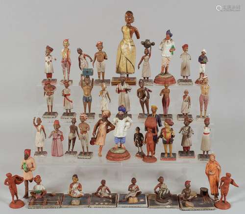 A LARGE COLLECTION OF INDIAN SCHOOL CARVED WOODEN FIGURES, o...