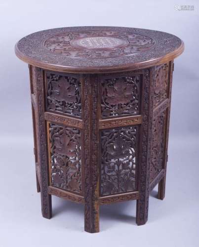 A GOOD MOORISH BONE INLAID CIRCULAR TABLE, carved with two b...