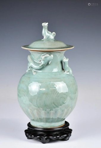 A Celadon-Glazed Dragon Cover Jar w/ Stand