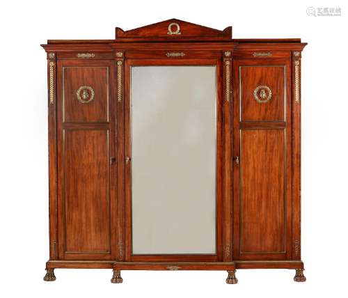 A FRENCH MAHOGANY AND GILT METAL MOUNTED WARDROBE IN EMPIRE ...