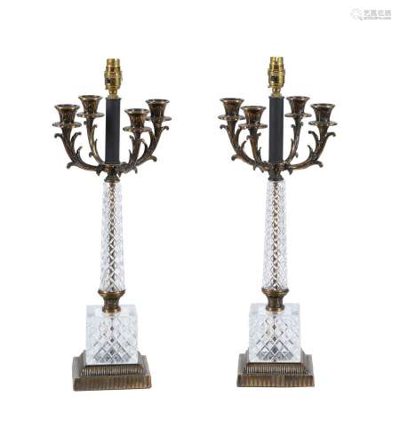 A PAIR OF PATINATED METAL AND GLASS MOUNTED TABLE LAMPS