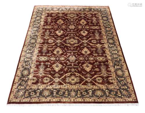 A LARGE AGRA STYLE CARPET
