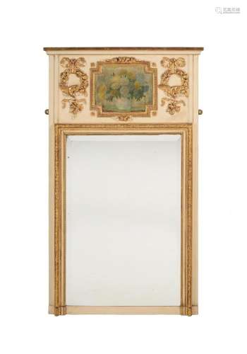 A FRENCH WHITE PAINTED AND PARCEL GILT TRUMEAU WALL MIRROR
