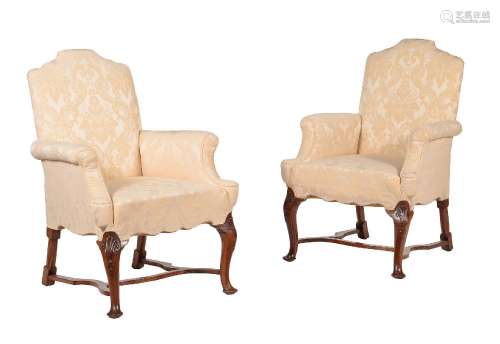 A PAIR OF WALNUT AND UPHOLSTERED ARMCHAIRS IN GEORGE II STYL...