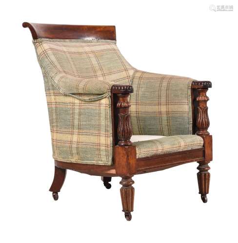 A WILLIAM IV MAHOGANY AND UPHOLSTERED LIBRARY ARMCHAIR