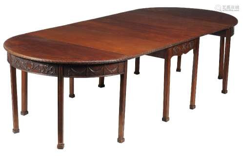 A MAHOGANY DINING TABLE IN GEORGE III STYLE