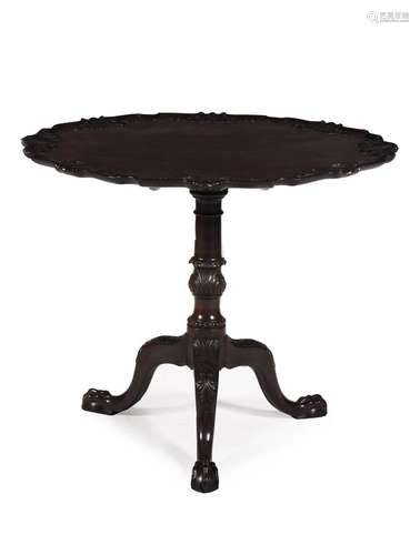 A CARVED MAHOGANY 'BIRDCAGE' TRIPOD TABLE IN IRISH GEORGE II...