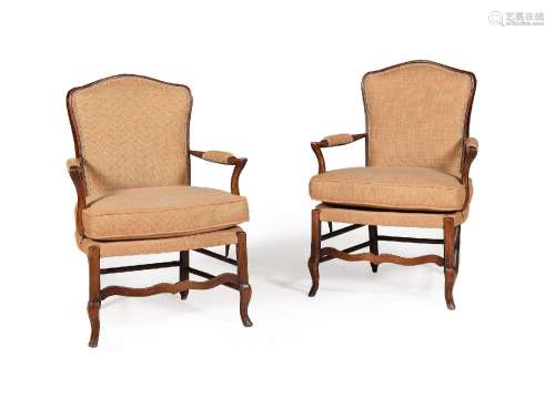 A PAIR OF FRENCH BEECH AND UPHOLSTERED ARMCHAIRS