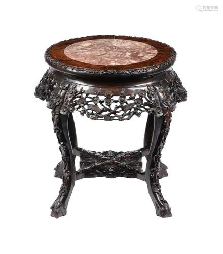 A CHINESE HARDWOOD AND VARIEGATED MARBLE INSET JARDINIERE ST...