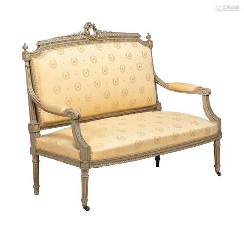 A CARVED AND PAINTED SOFA OR CANAPEIN LOUIS XVI STYLE