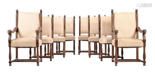 A SET OF EIGHT CARVED OAK DINING CHAIRS IN CONTINENTAL MID 1...