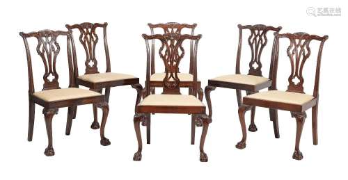 A SET OF SIX LATE VICTORIAN CARVED MAHOGANY DINING CHAIRS