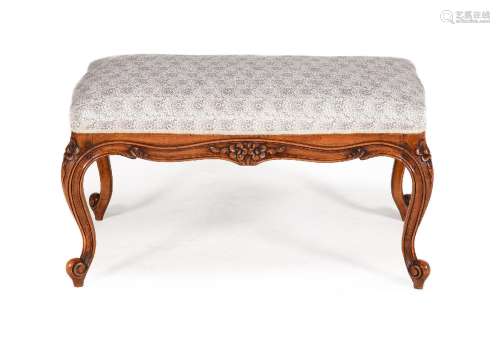A CARVED BEECH AND UPHOLSTERED CENTRE STOOL IN VICTORIAN TAS...