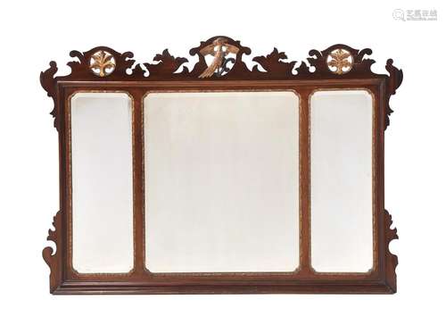 A MAHOGANY AND PARCEL GILT WALL MIRROR IN GEORGE II STYLE