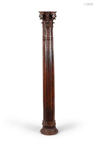 A CARVED OAK COLUMN, IN THE CORINTHIAN ORDER