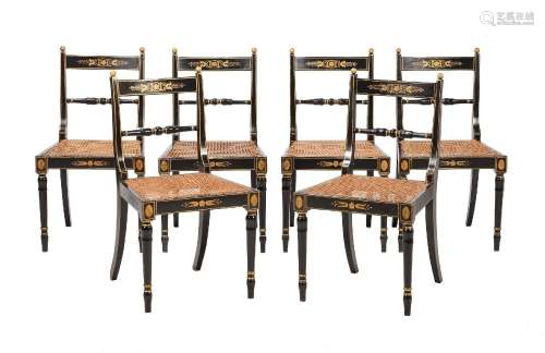 A SET OF SIX REGENCY EBONISED AND PARCEL GILT SIDE CHAIRS