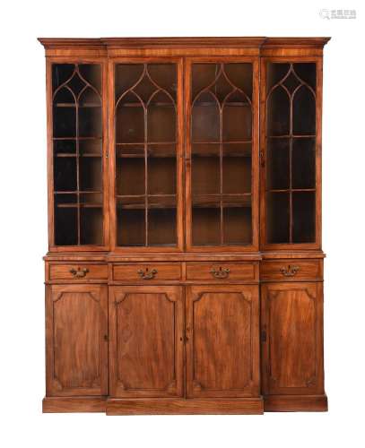 A MAHOGANY BREAKFRONT BOOKCASE IN GEORGE III STYLE