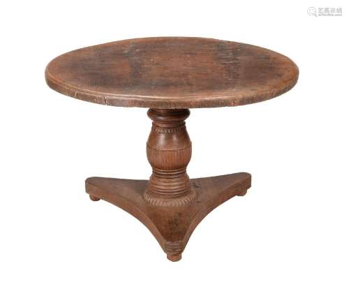 AN ANGLO-INDIAN HARDWOOD CIRCULAR CENTRE OR DINING TABLE