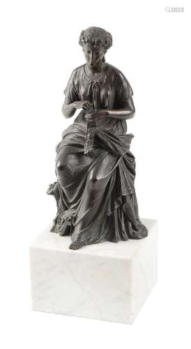 A BRONZE MODEL OF A LADY SEWING A BELL PULL