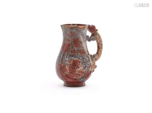 A CHINESE SOAPSTONE JUG