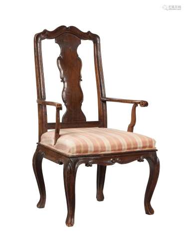 A FRENCH PROVINCIAL WALNUT ARMCHAIR