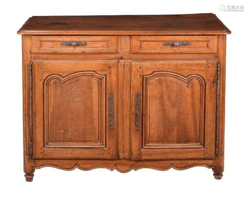 A LOUIS XV WALNUT AND FRUITWOOD COMMODE, CIRCA 1750